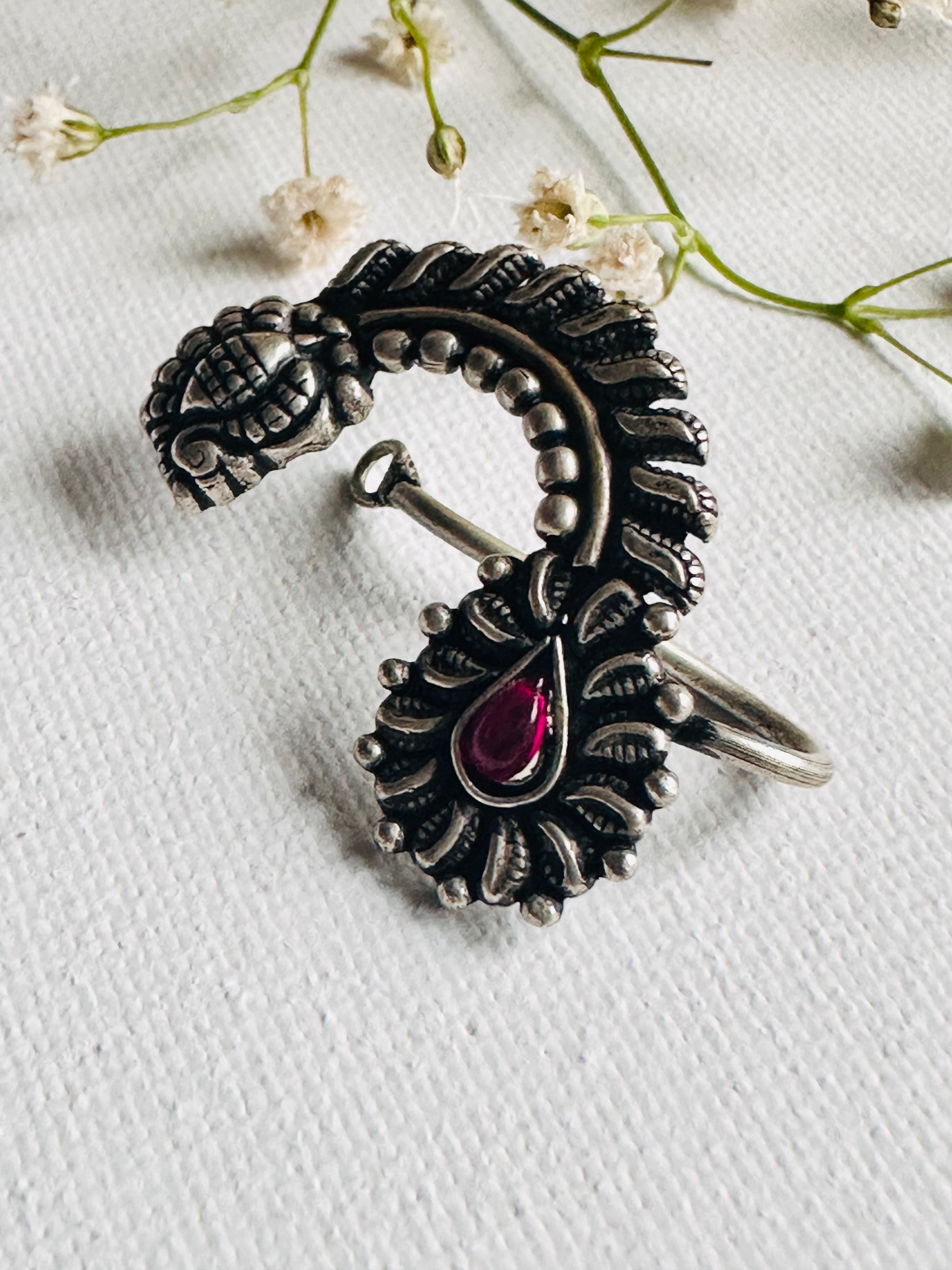 Silver oxide nose deals ring