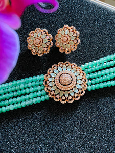 Green beads rose gold tone pendant and stud earrings