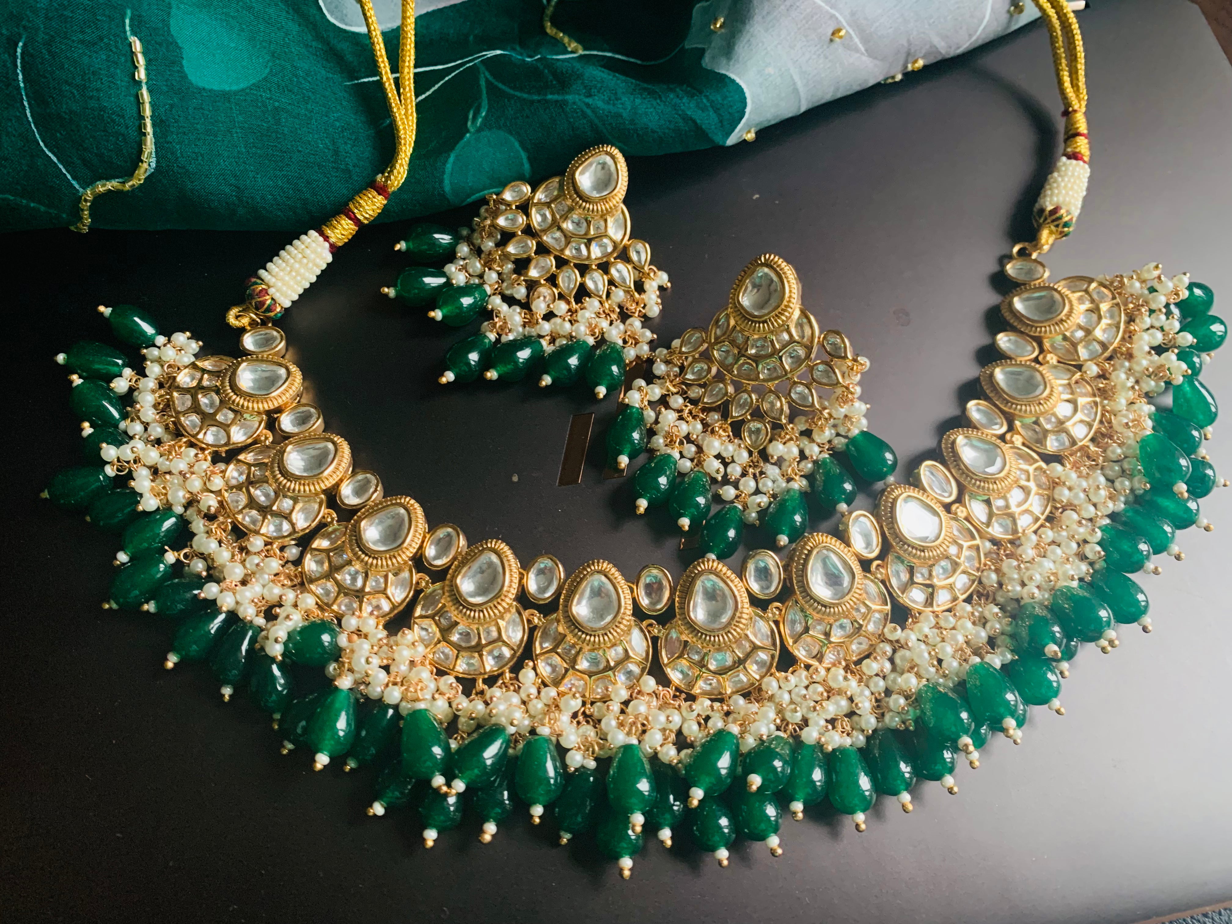 Emerald green coloured artificial uncut polki necklace PriVeda
